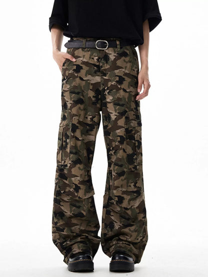 Camouflage pants worn by a person on a white background