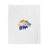 White blanket with rainbow-colored logo on a white background